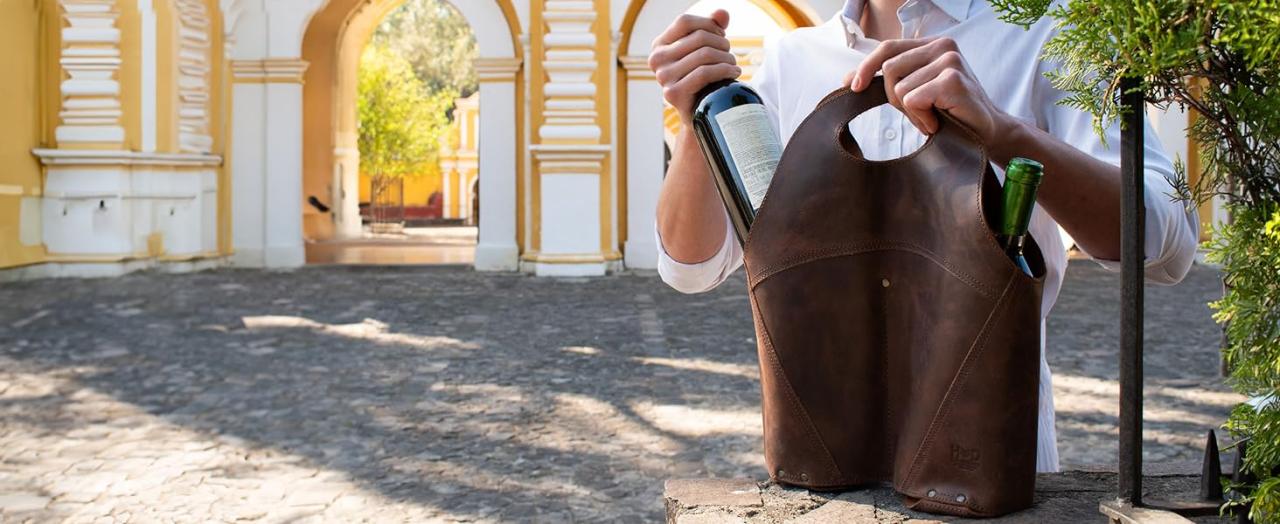 Hide and Drink Leather Double Wine Holder in front of a church