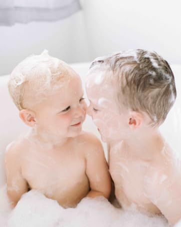 children suds in bath tub