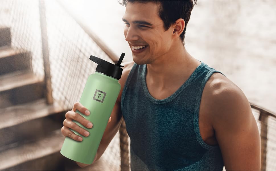 Image of a man holding a Wide Mouth Sports Water Bottle