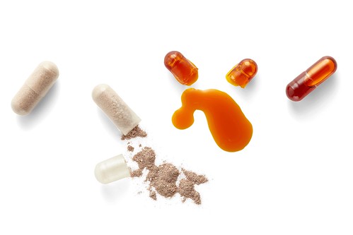 Nutritional-supplements-nutrition-vitamin-pill-crushed-broken-open-capsule-wellness-stock-photo-drug-pharmacy-natural-9-clipped